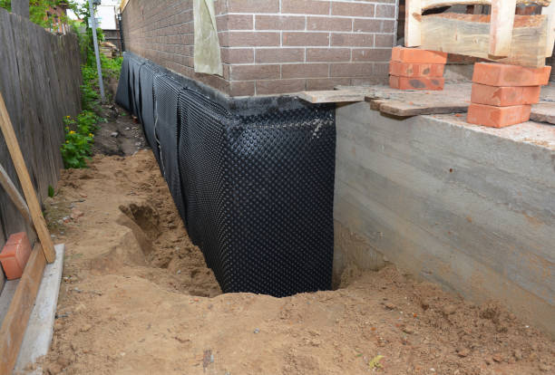Happy homeowners after waterproofing job in Washougal